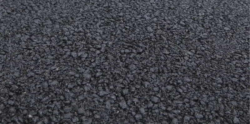 Black tarmac driveway installation for homes with smooth and durable surface