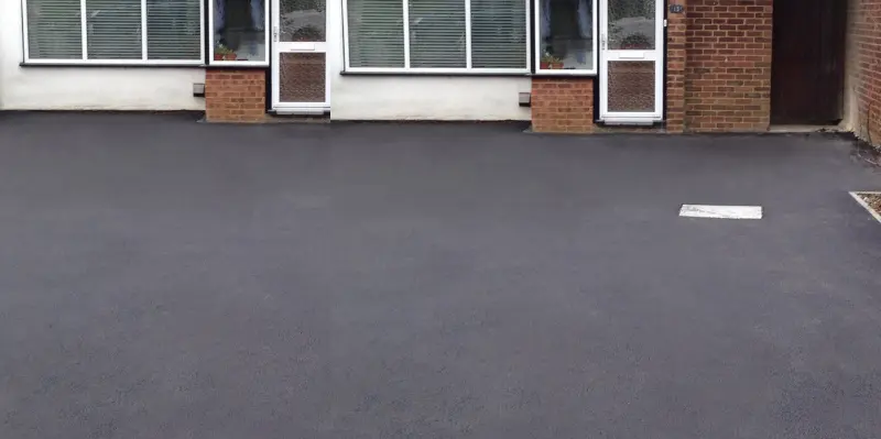 Professional tarmac driveway installation in Enfield with smooth, durable surfacing by First 4Paving.Professional tarmac driveway installation in Enfield with smooth, durable surfacing by First 4Paving.